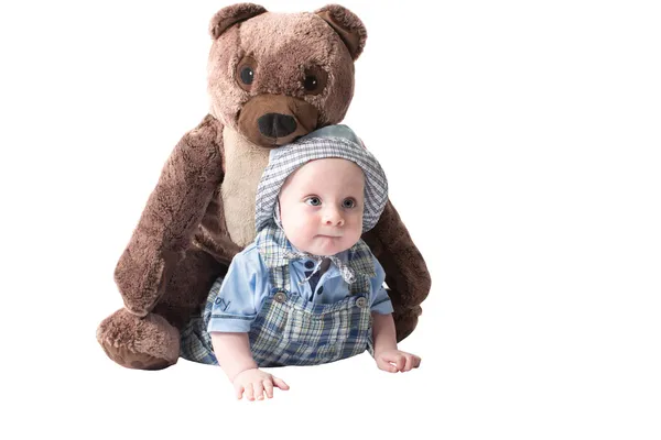 Schattig kind jongen met rplush speelgoed teddy bea geïsoleerd op witte achtergrond — Stockfoto
