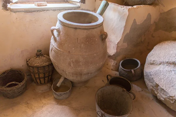 Museum with artifacts of ancient Greek pottery and clay (jug, pot, vase) in monastery in Messara Valley Crete, Greece — Stock Photo, Image