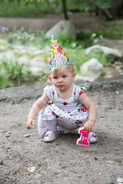 Adorable birthday girl child year-old in park at summer — Stock Photo, Image