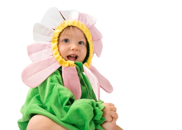 Αξιολάτρευτο παιδί κορίτσι, ντυμένος με κοστούμι λουλούδι που απομονώνονται σε λευκό φόντο. η έννοια της παιδικής ηλικίας και διακοπές — Φωτογραφία Αρχείου