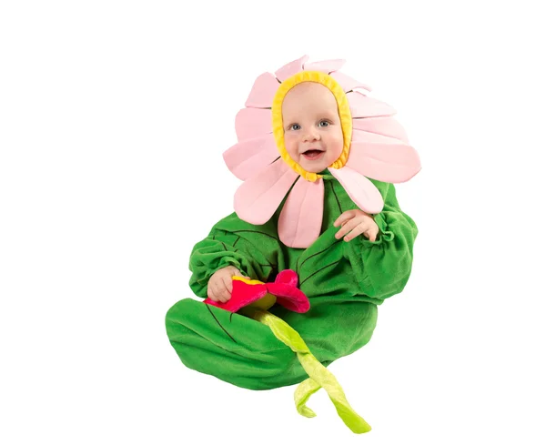 Menino adorável, vestido com traje de flor em fundo branco. O conceito de infância e férias — Fotografia de Stock