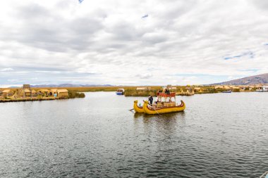 Traditional reed boat lake Titicaca,Peru clipart