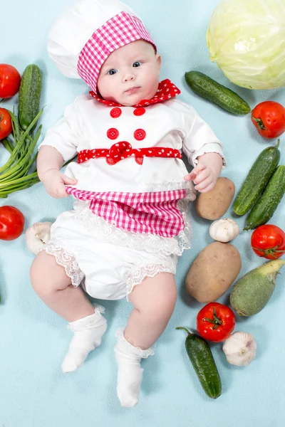 Het dragen van chef-kok hoed cook meisje van de baby — Stockfoto