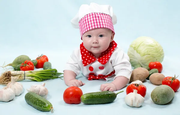 Bayi gadis juru masak mengenakan topi koki — Stok Foto