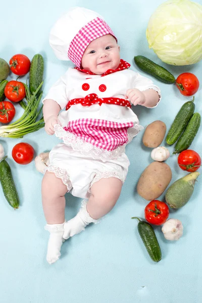 Het dragen van chef-kok hoed cook meisje van de baby — Stockfoto