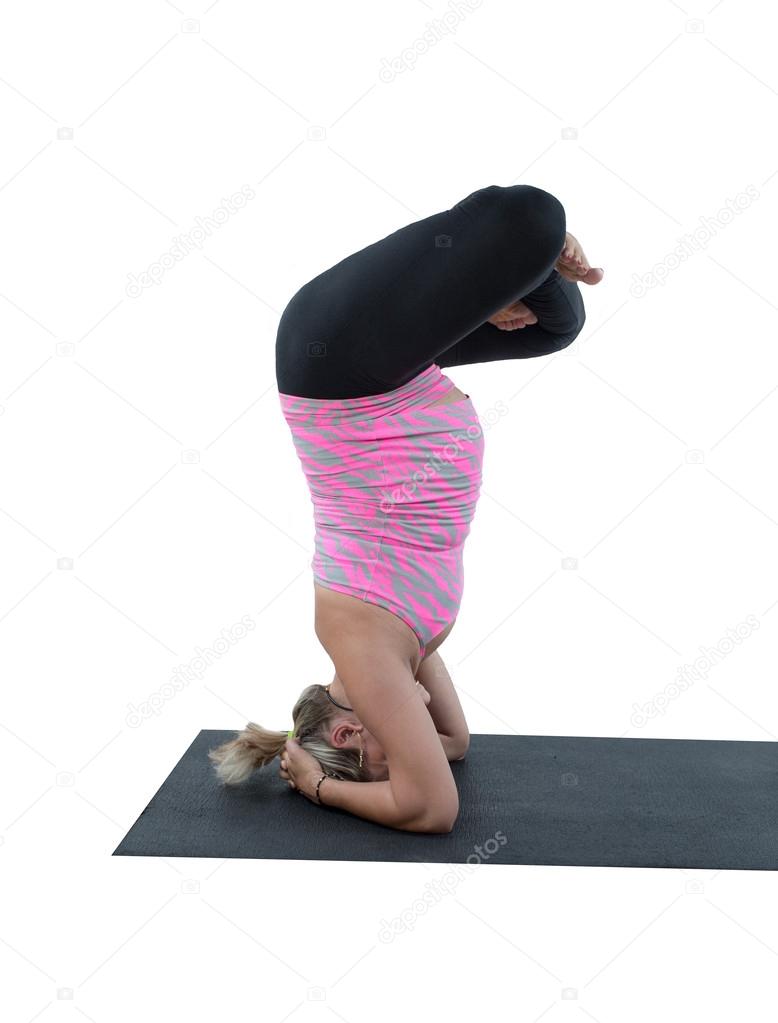 Pregnant fitness woman make stretch on yoga
