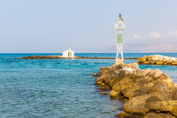 Old venetian lighthouse at harbor in Crete, Greece. Small cretan village Kavros. Travel Background — Stock Photo, Image