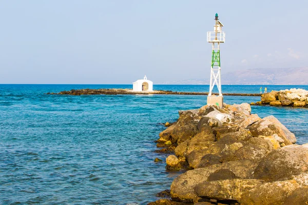 Old venetian lighthouse at harbor in Crete, Greece. Small cretan village Kavros. Travel Background — Stock Photo, Image