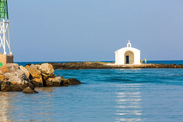 Lighthouse at harbor in Crete — Stock Photo, Image