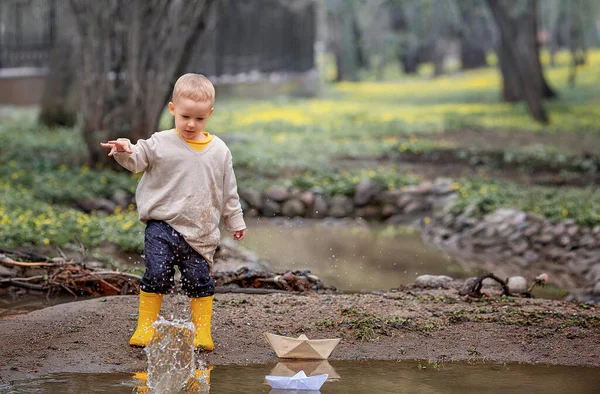 Portrait Adorable Little Kid Boy Rubber Boots Launch Paper Boats — Stock Photo, Image
