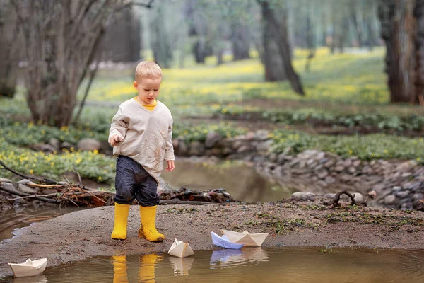 Portrait Adorable Little Kid Boy Rubber Boots Launch Paper Boats — Stock Photo, Image