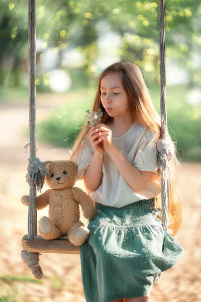 Happy Laughing Kid Girl Long Hair Enjoying Swing Ride Playground — Stockfoto