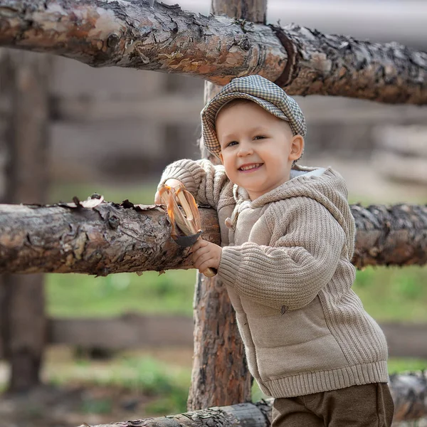 Portrait Bully Boy Kid Slingshot Aims Someone Fence Village Outdoors — Stock Photo, Image