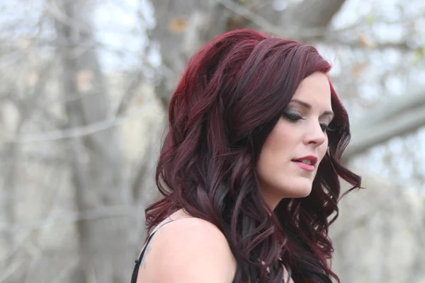 Beautiful brunette biker girl — Stock Photo, Image