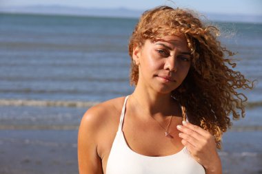 Photo of beautiful Brazilian lady on the beach