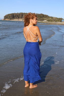 Photo of beautiful Brazilian lady on the beach