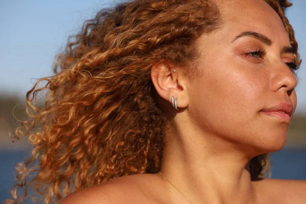 Photo of beautiful Brazilian lady on the beach