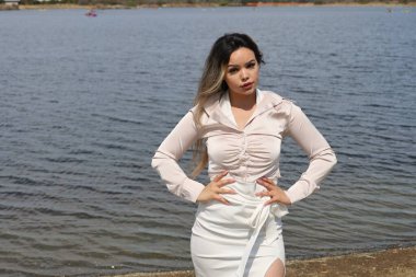 Photo of beautiful lady in a park on a summer day