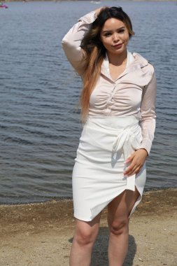 Photo of beautiful lady in a park on a summer day