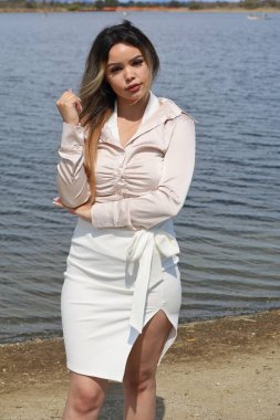 Photo of beautiful lady in a park on a summer day