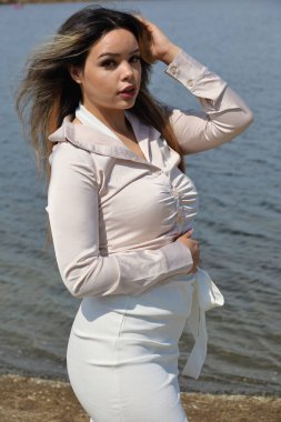 Photo of beautiful lady in a park on a summer day