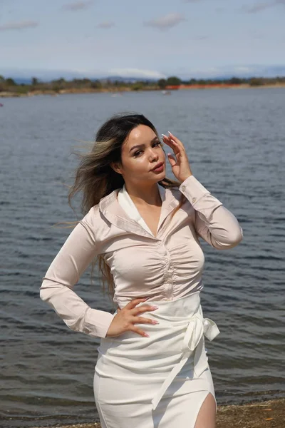 Photo of beautiful lady in a park on a summer day