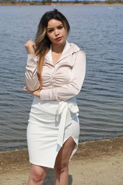 Photo of beautiful lady in a park on a summer day