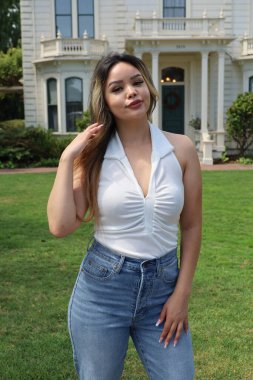 Photo of beautiful lady in a park on a summer day