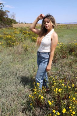 Photo of beautiful lady in a park on a summer day