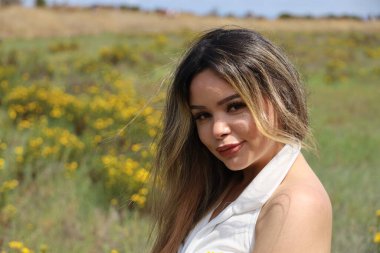 Photo of beautiful lady in a park on a summer day