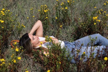 Photo of beautiful lady in a park on a summer day
