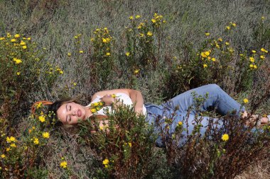 Photo of beautiful lady in a park on a summer day