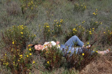 Photo of beautiful lady in a park on a summer day