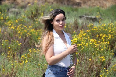 Photo of beautiful lady in a park on a summer day