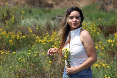 Photo of beautiful lady in a park on a summer day