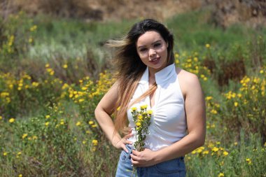 Photo of beautiful lady in a park on a summer day