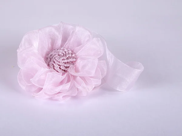 Pink flower from a fabric Stock Picture