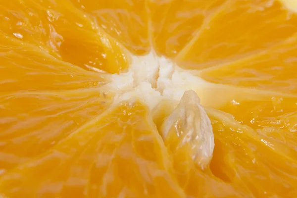 Pedra laranja em polpa de laranja — Fotografia de Stock