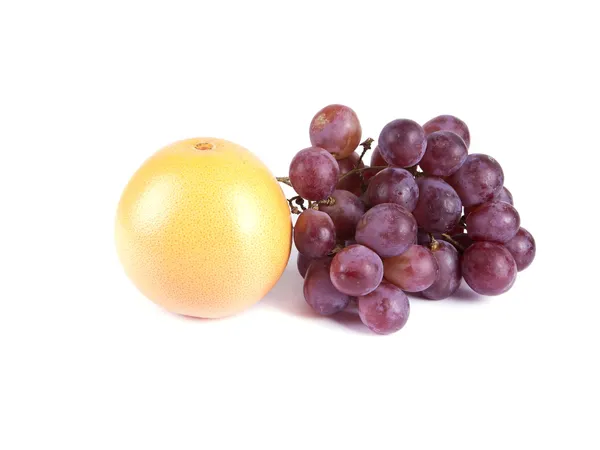 Fruit composition of ripe grapefruit and grapes — Stock Photo, Image