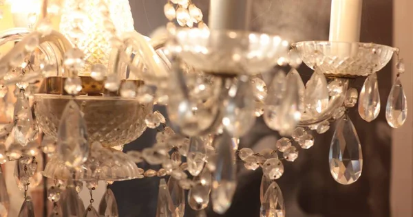 Shiny elegant chandelier with diamond shaped crystal pendants look like jewelry — Stock Photo, Image