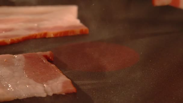 Sequence of time lapse shoots of frying eggs and bacon — Stock Video
