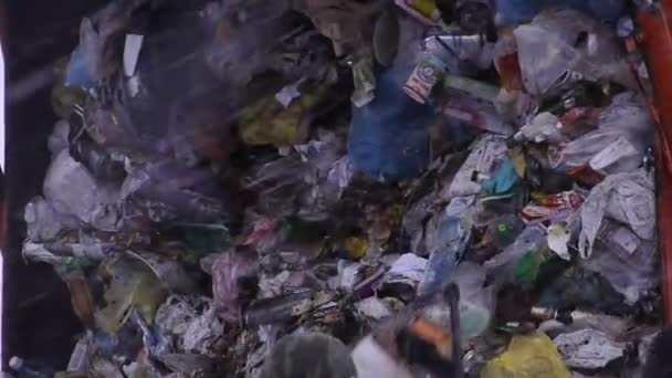 Medium shot of garbage dump rubbish dumping (static - day) — Stock Video