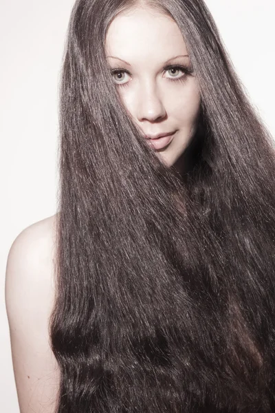 Beautiful woman with stunning hair — Stock Photo, Image