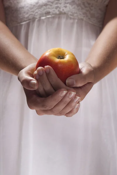 Girl, holding an apple