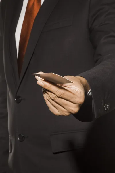 Business Man holding a business card — Stock Photo, Image