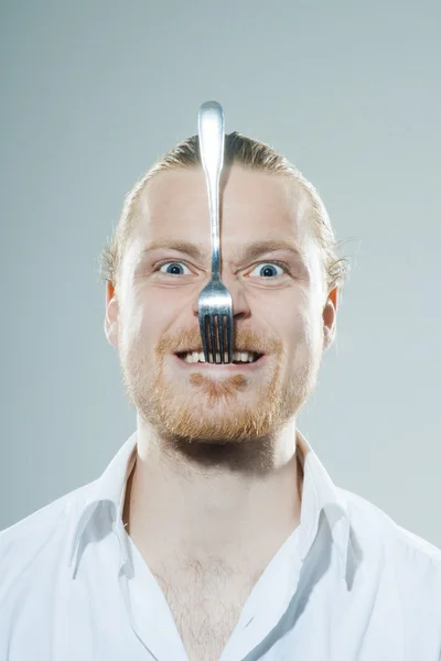 Humorous man with fork — Stock Photo, Image