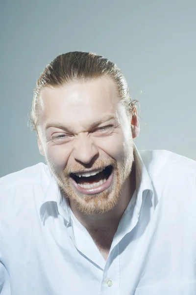 Laughing young man — Stock Photo, Image