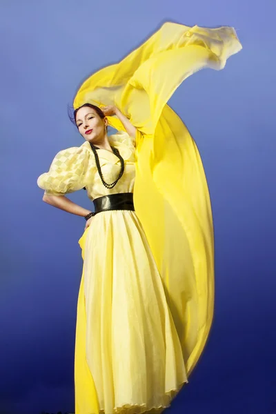 Beautiful and happy young woman dancing — Stock Photo, Image