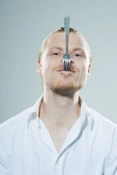 Humorous man with fork — Stock Photo, Image