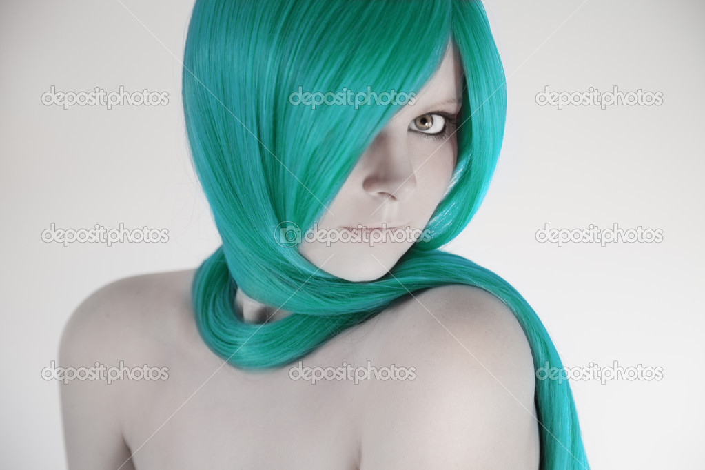 Beautiful woman with turquoise hair